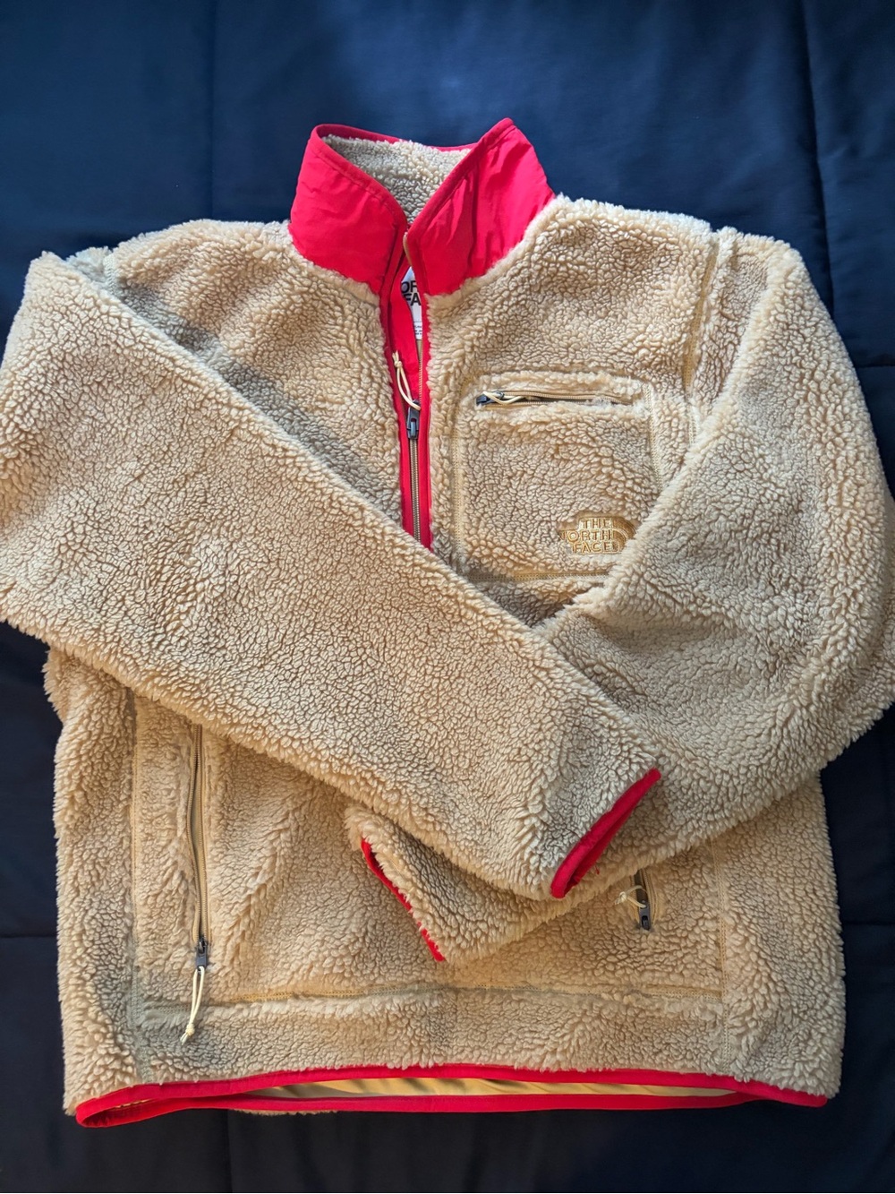 The North Face Beige Sherpa Jacket with orange Trim